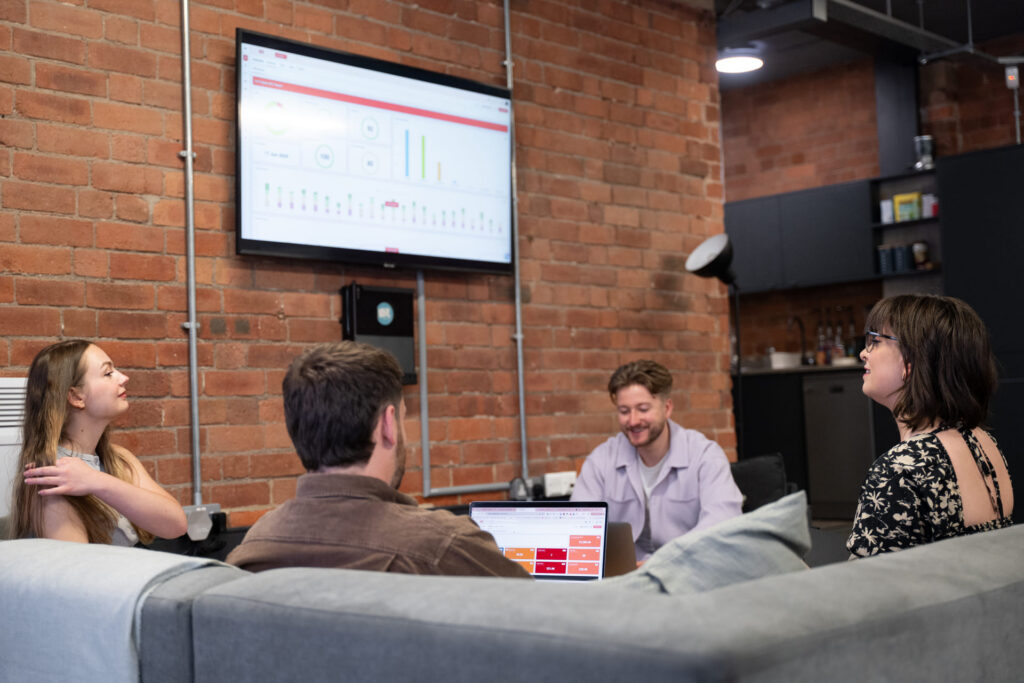 The Unit team discussing marketing performance